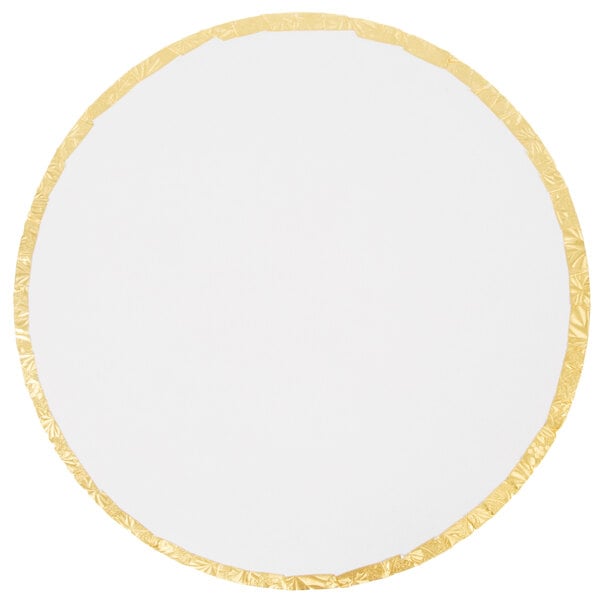 A white round Enjay cake drum with gold trim.