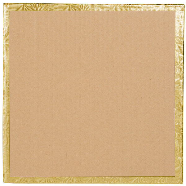 A close-up of a cardboard square with gold trim.