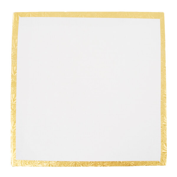 A white square surface with a gold border.