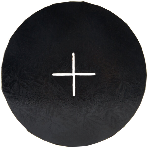 A black circle with three white crosses.
