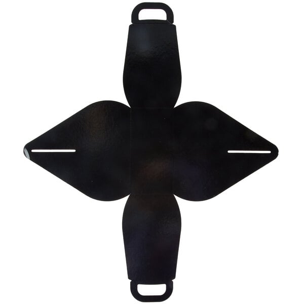 A black box with a cross-shaped insert.