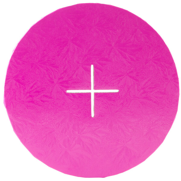 A pink circle with a white cross.