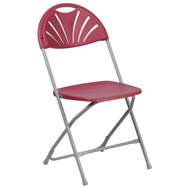 A burgundy Flash Furniture plastic folding chair with a metal frame.