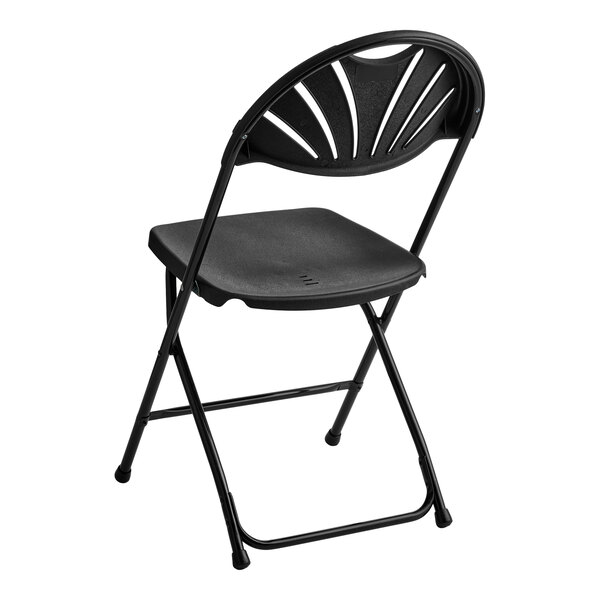 A black folding chair with a fan-shaped design on the backrest and a solid seat.