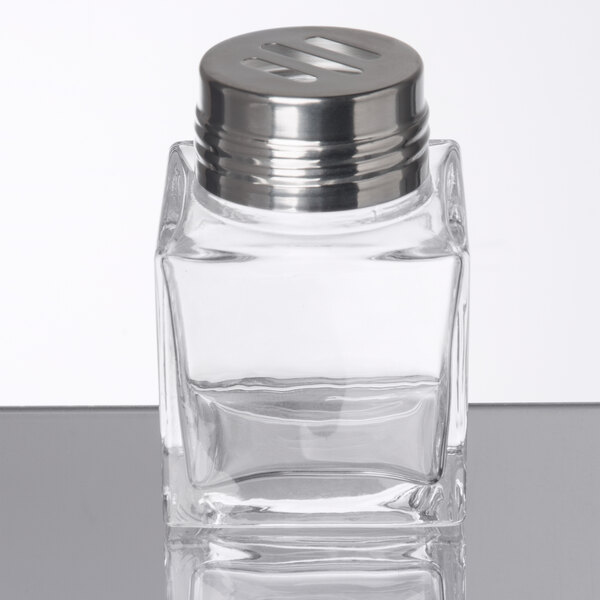 An American Metalcraft square glass cheese shaker with a slotted stainless steel top.