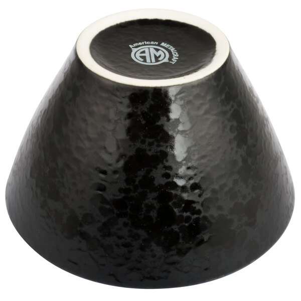 An American Metalcraft black porcelain bowl with a white rim.