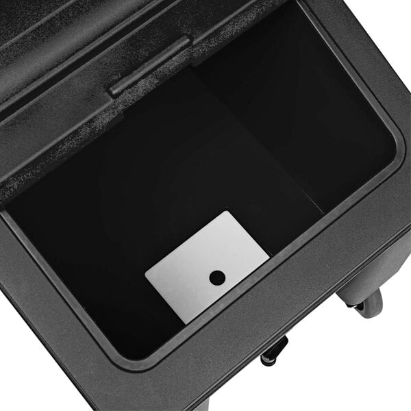 A black IRP mobile ice bin on a counter.