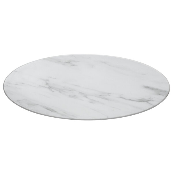 An American Metalcraft oval melamine serving board with a faux white marble design on a white table.