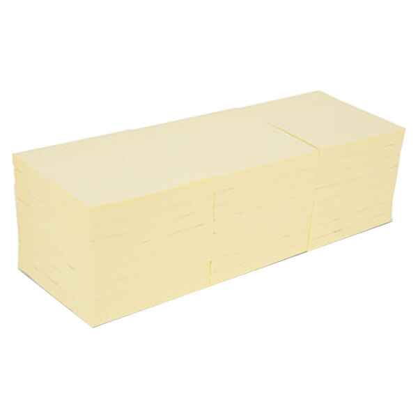 A stack of Universal yellow sticky notes.