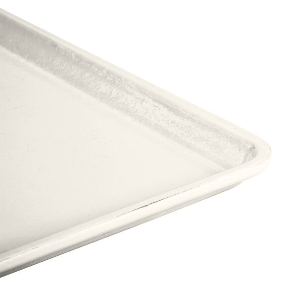 A white Cambro dietary tray with a handle.