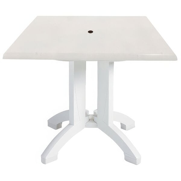 A white square Grosfillex pedestal table.
