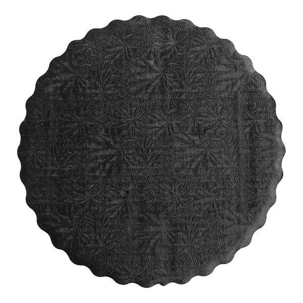 A black Enjay laminated corrugated cake circle with a pattern on it.