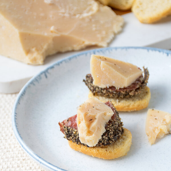 Stella 10 lb. Aged Asiago Cheese Half Wheel