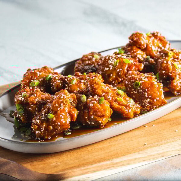 Pilgrim's Fully Cooked Breaded Chicken Wing-Dings 7.5 lb. - 2/Case