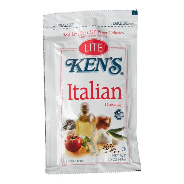 A single-serve packet of Ken's Lite Italian Dressing with images of vegetables and seasonings on the front.