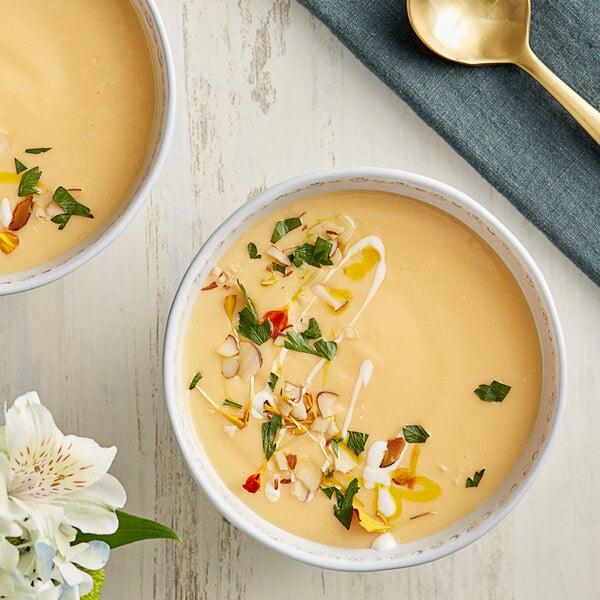 bowl of crab bisque with bacon and scallions