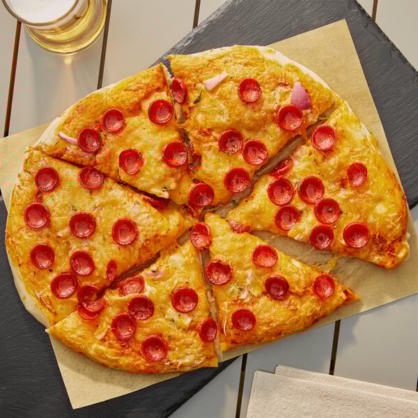 A pizza with Hormel pepperoni slices on a plate.
