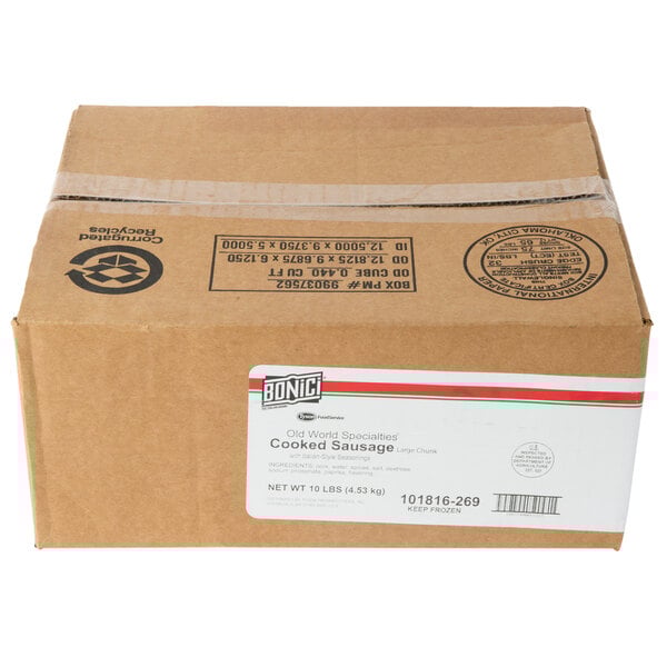 A white box with a red and green label for Hillshire Farm Fully Cooked Sausage Topping Crumbles.