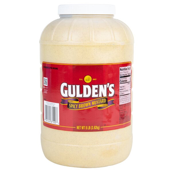 A jar of Gulden's Spicy Brown Mustard on a white background.