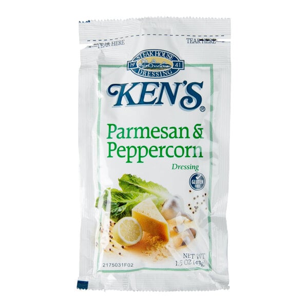 A single-serve packet of Ken's Parmesan & Peppercorn Dressing with images of cheese, peppercorns, and herbs on the front.