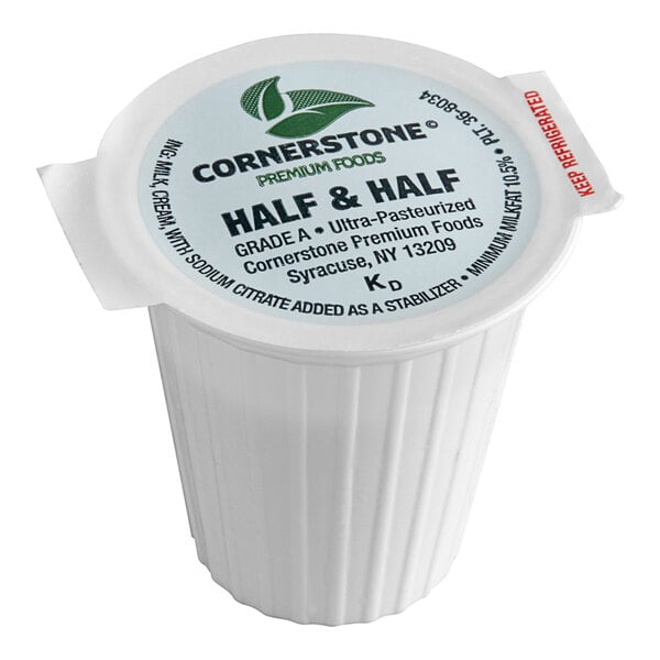A white plastic container of Grade A Ultra-Pasteurized Half and Half Creamer with a black label.