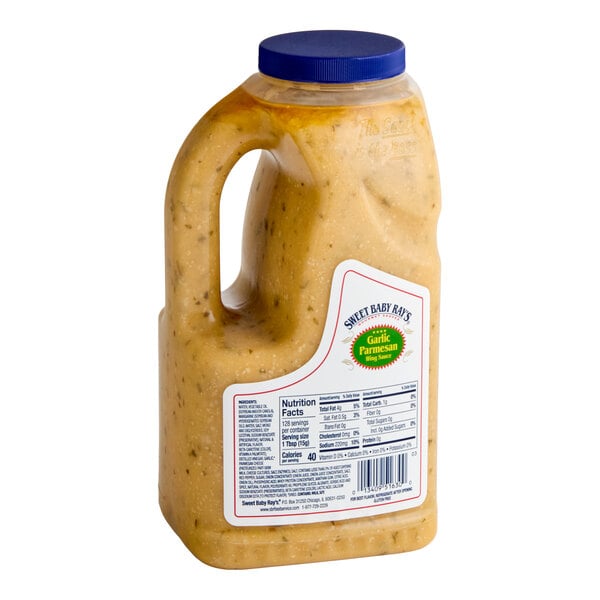 A 0.5 gallon jug of Sweet Baby Ray's Garlic Parmesan Wing Sauce with a blue cap and handle.