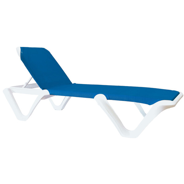 A white chaise lounge chair with a blue sling seat.