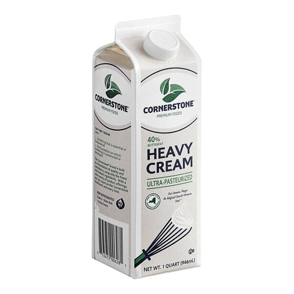 A white carton of Grade A Ultra-Pasteurized Heavy Cream.