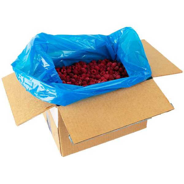 A blue bag full of IQF red raspberries.