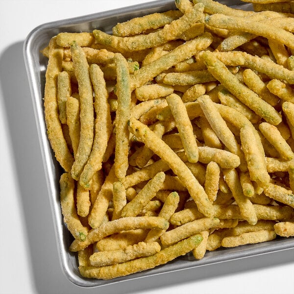 A tray of toasted onion battered green beans.