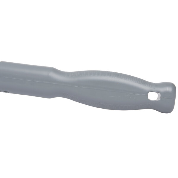 A Unger Ergo toilet bowl swab with a grey plastic handle and a hole.