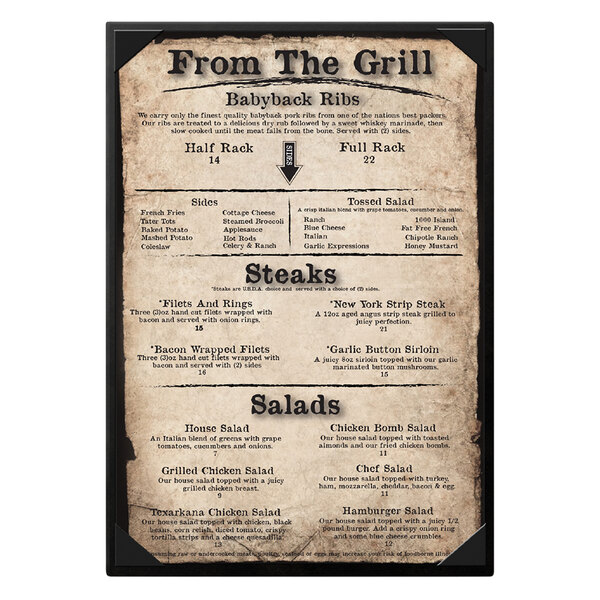 A black leather-like Chadwick Collection menu cover on a table in a farm-to-table restaurant.