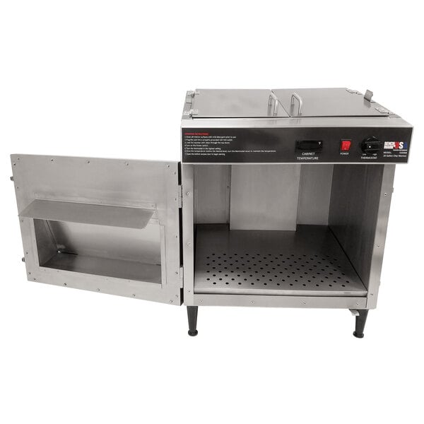 A Benchmark USA tortilla chip warmer on a counter with the door open.