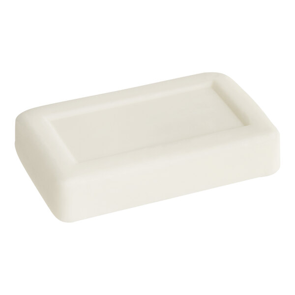A white rectangular Novo Essentials face and body soap bar wrapped in white.