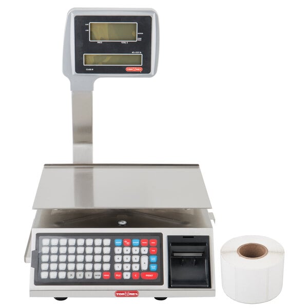 A Tor Rey WiFi price computing scale with a keyboard and roll of paper.