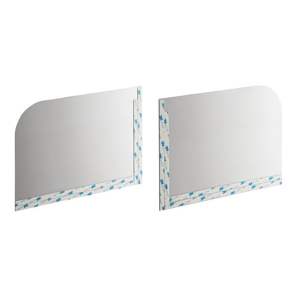 Two rectangular stainless steel panels with one rounded corner each, featuring protective film and adhesive strips along the edges.