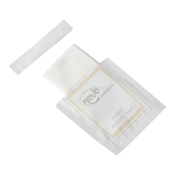 A single-use makeup remover wipe in an individual Novo Essentials branded packet.