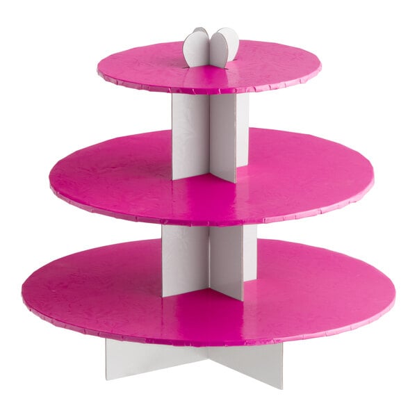 A three-tier disposable pink cupcake treat stand.