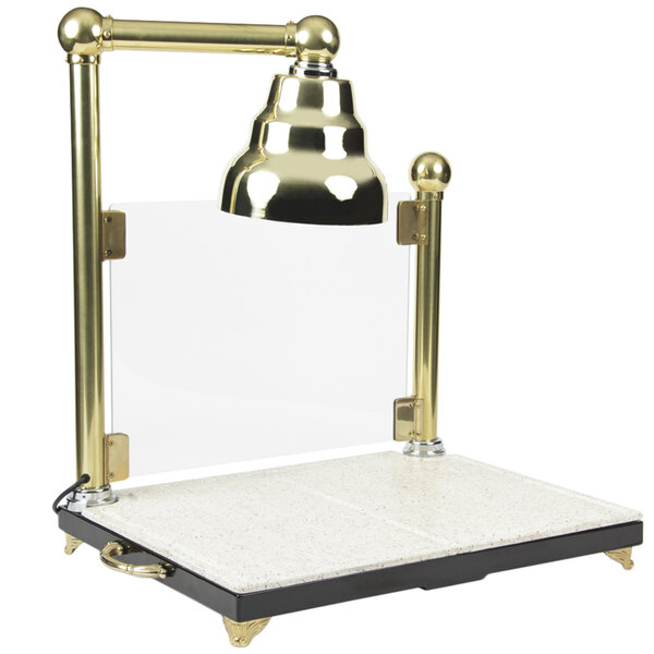 A Bon Chef brass lamp on a white carving station with a sneeze guard.