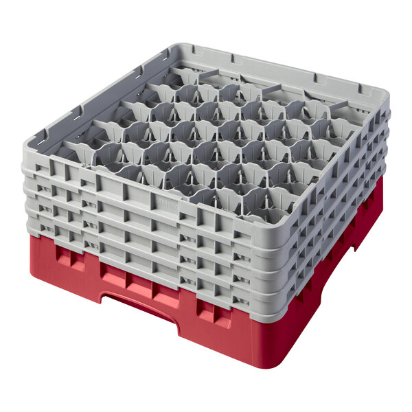 A red and gray plastic Cambro glass rack with 4 gray plastic extenders.