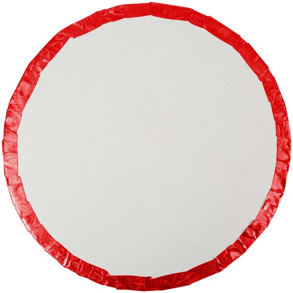 A white round cake drum with a red rim.