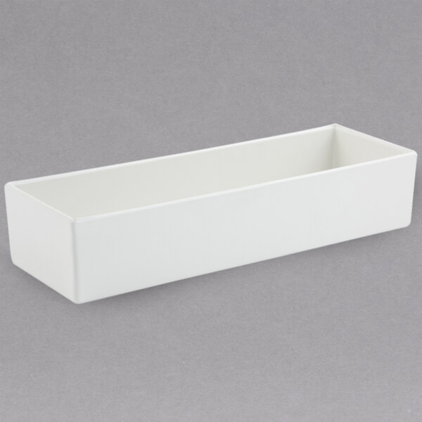 A white rectangular container with a handle.