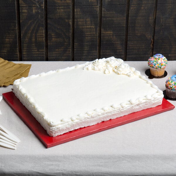 Enjay red cake board with white cake on top