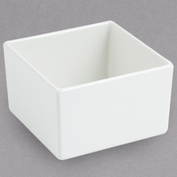 A white square Bon Chef bowl with a sandstone finish.