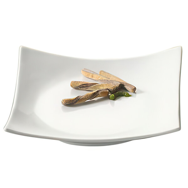 A white square porcelain plate with sushi on it.