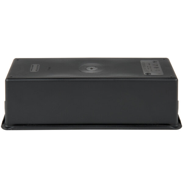 A black Matfer Bourgeat bread loaf pan with a round button on top and a round hole in the lid.