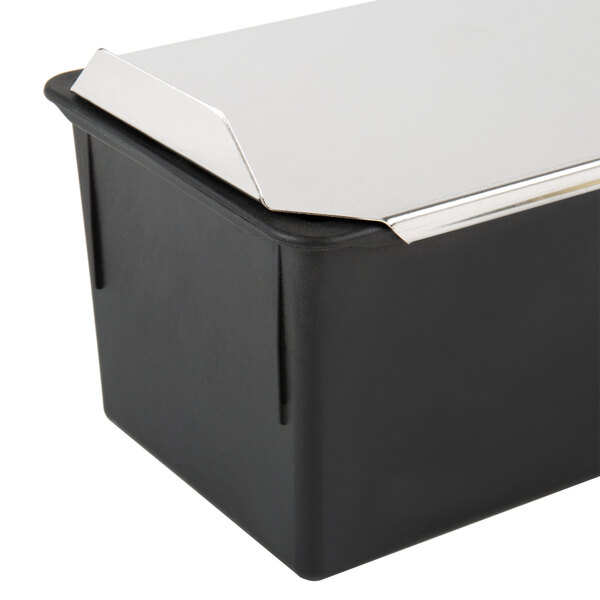A black and silver Matfer Bourgeat loaf pan with lid.