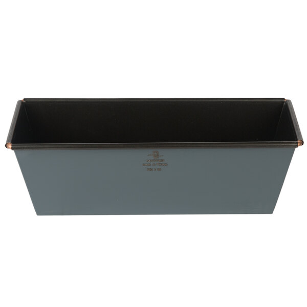 A black rectangular metal loaf pan with a white border.
