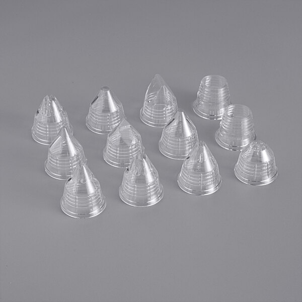 A clear plastic cone-shaped container holding 10 Matfer Bourgeat interchangeable pastry tips.