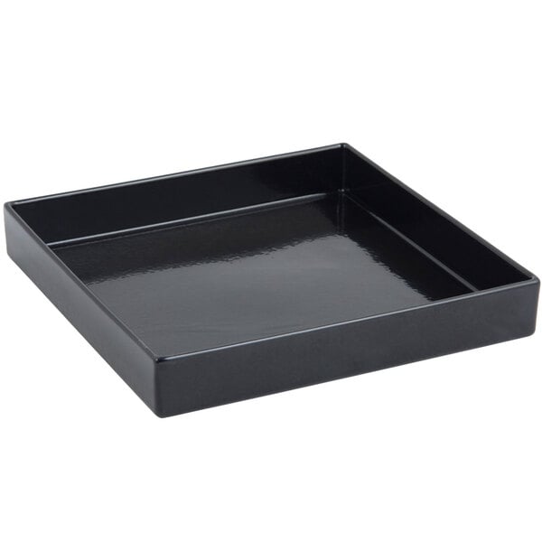 A black square Bon Chef bowl with a sandstone finish.